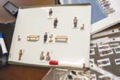 Photograph of a magnetic white board and magnets